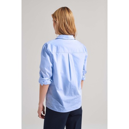 Blue Mika shirt ouvre sa boutique