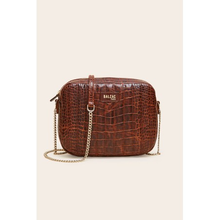 Embossed cognac caesar bag sur le site 