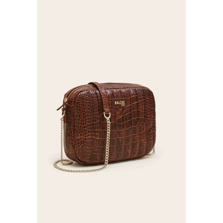 Embossed cognac caesar bag sur le site 