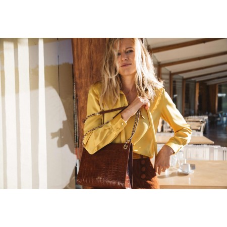 Astrée yellow gold blouse s'inspire de l'anatomie humaine