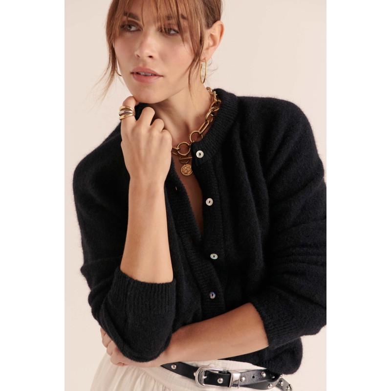 Cardigan Come noir ouvre sa boutique