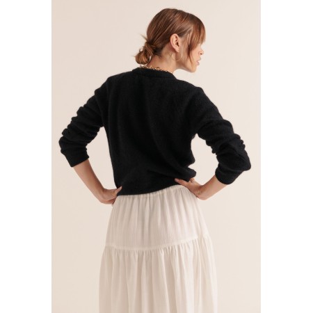 Cardigan Come noir ouvre sa boutique