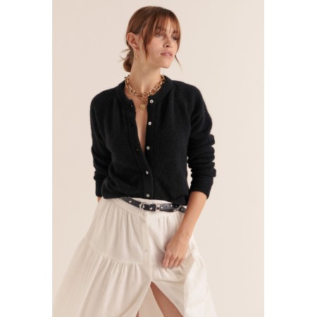 Cardigan Come noir ouvre sa boutique