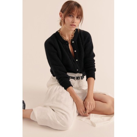 Cardigan Come noir ouvre sa boutique