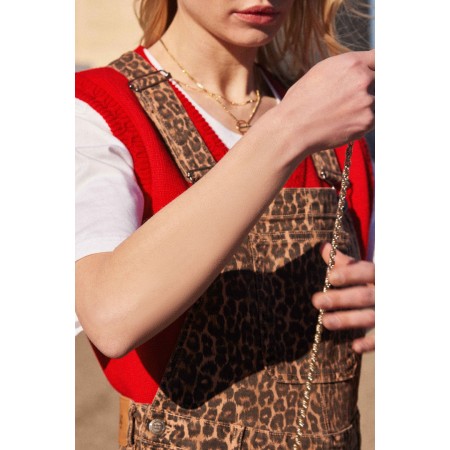 Gilet Constant rouge Voir les baskets